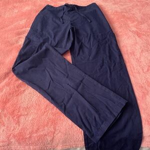 Unisex navy blue scrub bottoms, size XS.